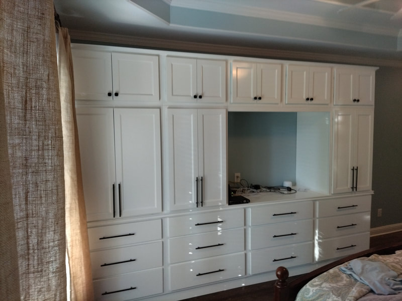 Custom built in cabinets Armoire for clothing storage solution. Atlanta Georgia